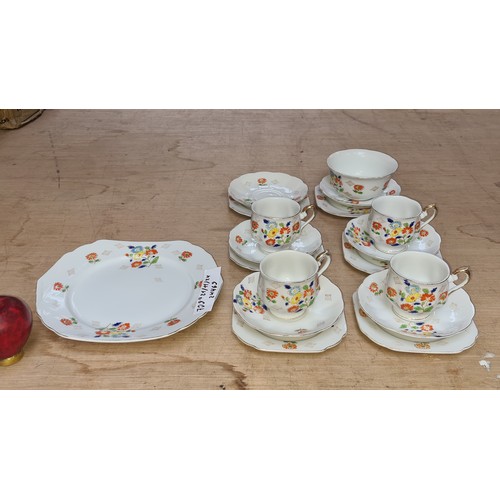 822 - A very pretty hand painted 18 piece pretty made in Japan teaset.