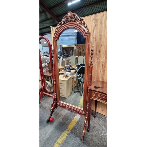 494 - Star Lot : A super quality large Victorian style cheval mirror featuring elaborate carving and bevel... 