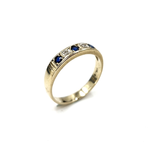 25 - Star lot : A nine carat gold sapphire & diamond ring. Ring size - O. Weight - 2.25 grams. Boxed.