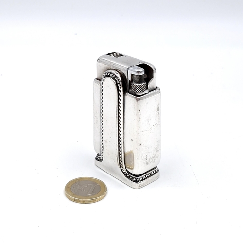 506 - A Quercia silver plated gas lighter with striker to base. Weight - 207 grams. Unusual piece.