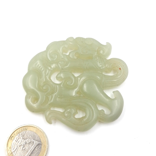 507 - A natural jade Chinese circular pendant - stone cold to touch. Dimension: 6 cms diameter. Weight - 3... 