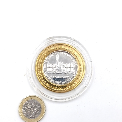 515 - An encapsulated Las Vegas .999 silver coin. Details as per photograph. Approx. 47 grams.