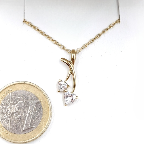 518 - A nine carat gold gem set pendant necklace. Length of chain - 44 cms. Weight - 2.3 grams.