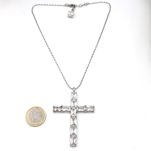 541 - A sterling silver crystal cut cross pendant necklace. Length of chain - 42 cms. Boxed.