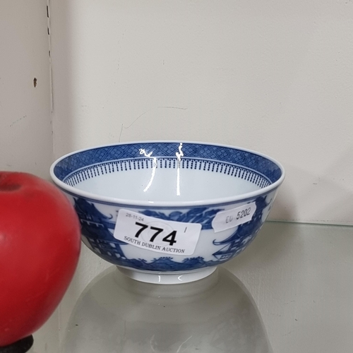 774 - A Tiffany & Co small porcelain bowl in a blue and white pattern. Stamped 