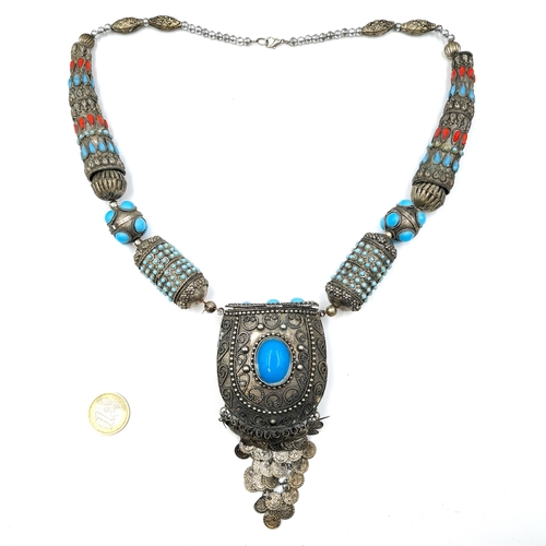 563 - A very fine vintage Indian hinged pendant necklace set with turquoise and coral stones. Length of ne... 