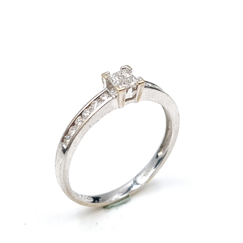 567 - Star lot : An 18 carat white gold vari cut diamond ring. Weight of diamonds - 0.25 carats. Stamped t... 