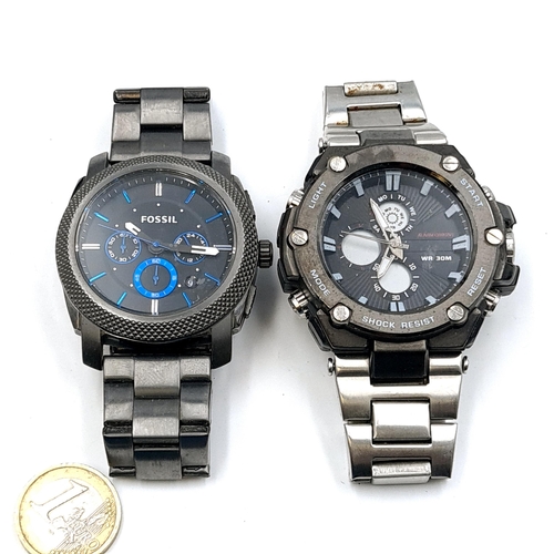 574 - Two chronograph wristwatches - Including a Fossil. Both with metal bracelets.