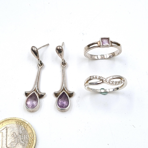 592 - A collection of silver items consisting of a pair of drop amethyst pendant stud earrings with no bac... 