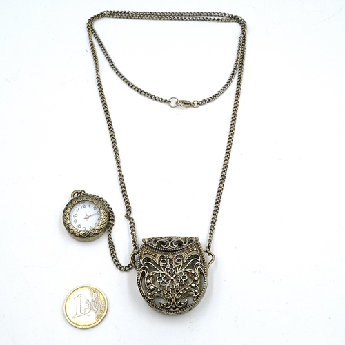 597 - A vignette style pendant necklace. Length of chain - 70 cms. Total weight - 51 grams.