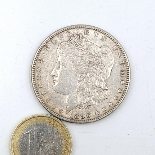 623 - An 1898 United States of America Morgan silver one dollar coin. In very good condition, lots of deta... 