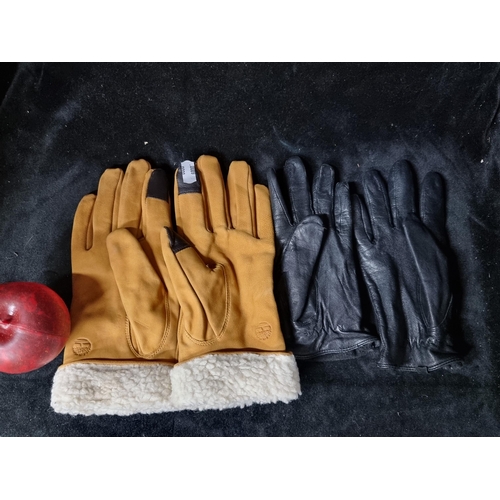 819 - Two pairs of ladies gloves including a pair of fully lined Timberland gloves.