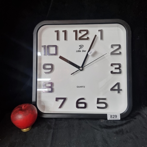 829 - A Little Star branded vintage  battery operated wall clock.