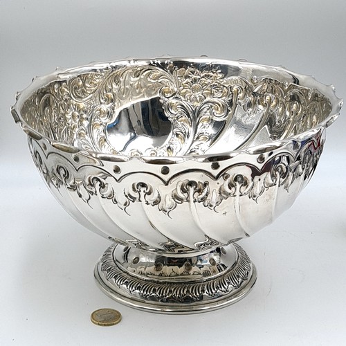 658 - Super Star Lot: An impressive antique very large sterling silver embossed centerpiece pedestal fruit... 