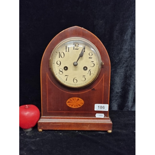 1181 - A 1930s antique mahogany mantel clock displaying beautiful marquetry and string inlay to front. Sat ... 