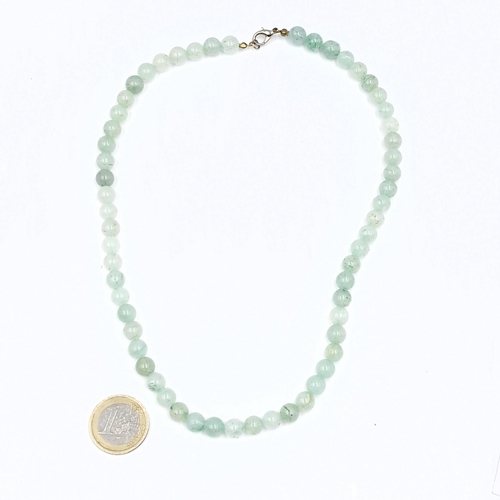 1209 - A vintage Aventurine polished quartz stone necklace. Stones cold to touch. Length - 44 cms. Weight -... 