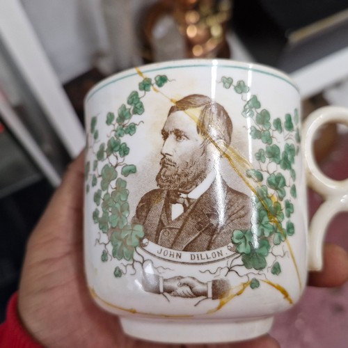 96 - Two very rare, 19th century, S & P cups with transfer decorated images of John Dillon and Michael Da... 