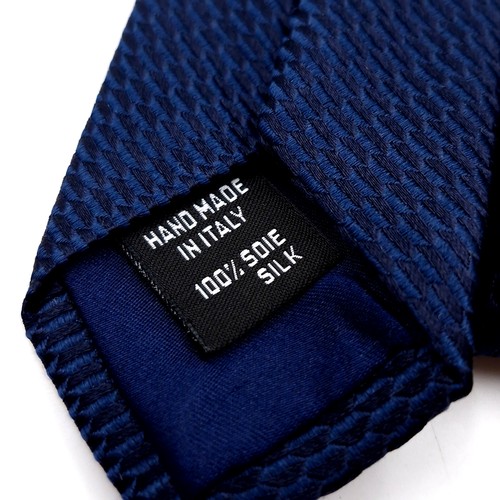 42 - A designer Rolex boxed navy blue tie - unused. Label as per photographed. Similar online for €120 +