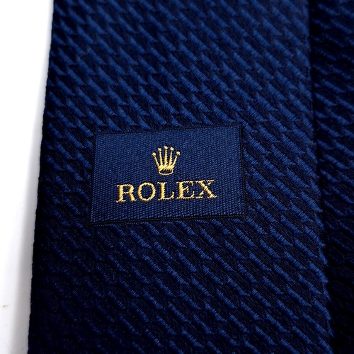 42 - A designer Rolex boxed navy blue tie - unused. Label as per photographed. Similar online for €120 +