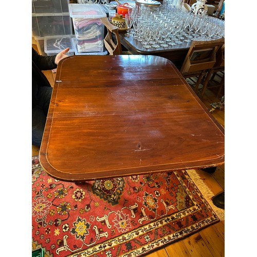 1019 - Star Lot : An Edwardian drop leaf table with lovely flamed mahogany grain and string inlay , From th... 