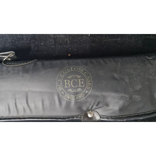 818 - A BCE two piece snooker cue with nylon carry case and two chalks. Cue tip appears to be in good orde... 