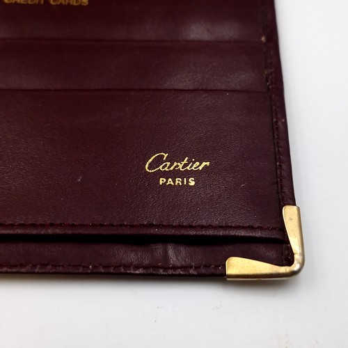 19 - Star Lot : An original designer calf leather travel document wallet by Cartier Paris. Dimensions: 20... 