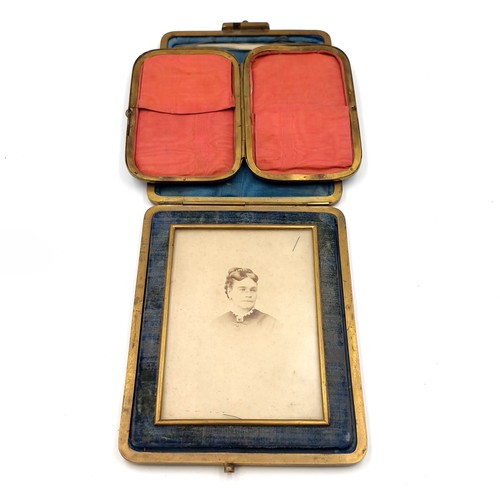 58 - Two antique items consisting of a portrait glazed photograph contained in a velvet lined metal frame... 