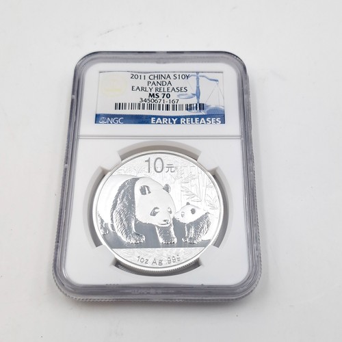 512 - An encapsulated one ounce .999 silver early release panda silver coin dated 2011. Fm 70