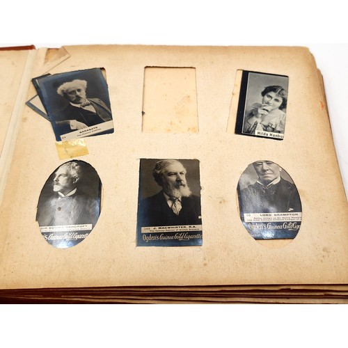 602 - A fully furnished photo album dated 1902 with a complete and varied portraiture examples.