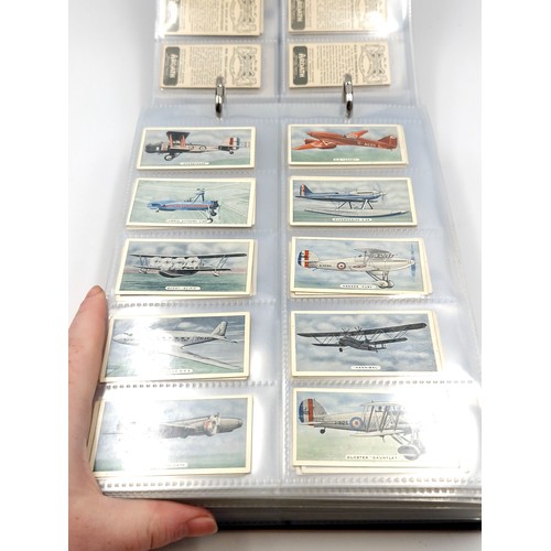 601 - A superb cigarette card album consisting of various subject matter. Includes sets of Downland, 'Figu... 