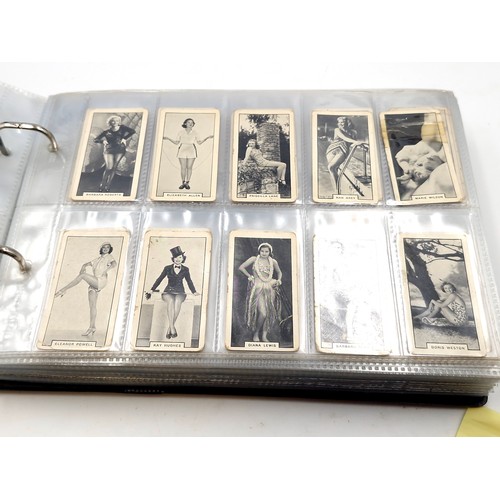 601 - A superb cigarette card album consisting of various subject matter. Includes sets of Downland, 'Figu... 