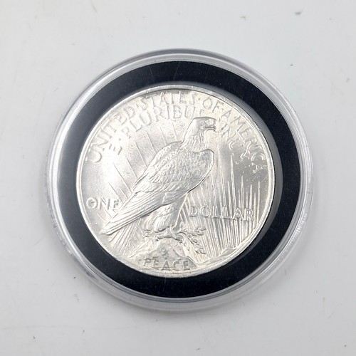 621 - A 1924 US Peace silver one dollar .9999 silver once . 100 years old.