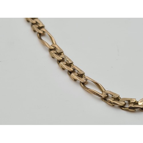 546 - Star Lot : A heavy Figaro link necklace set in nine carat gold (375). Length of necklace - 50 cms. W... 