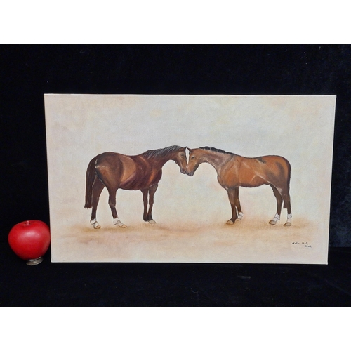 65 - A fine original oil on canvas painting. Features two horses embracing each other. Rendered in a brow... 