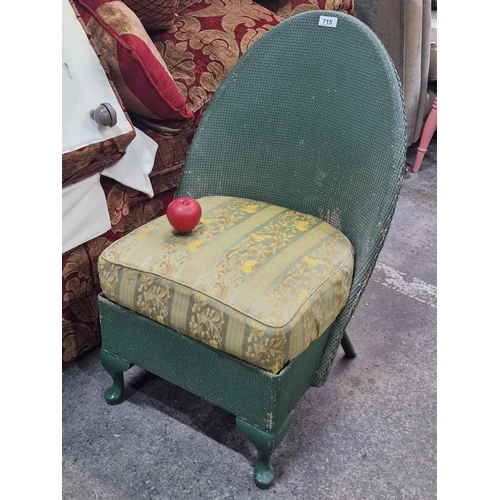 715 - A gorgeous Lloyd Loom chair with original sprung seat that has more recently been reupholstered. Fra... 