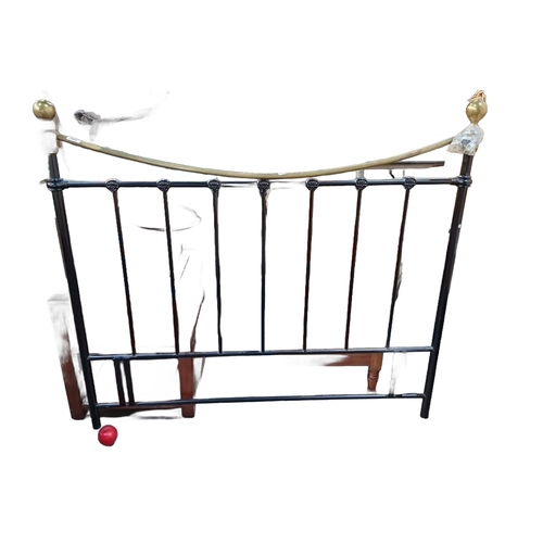 1397 - A  brass and iron bed frame with detailed finials, showcasing classic design with sturdy constructio... 