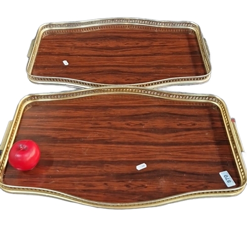 1398 - Pair of vintage faux wood and brass serving trays with ornate edging. Classic mid-century design. Pr... 