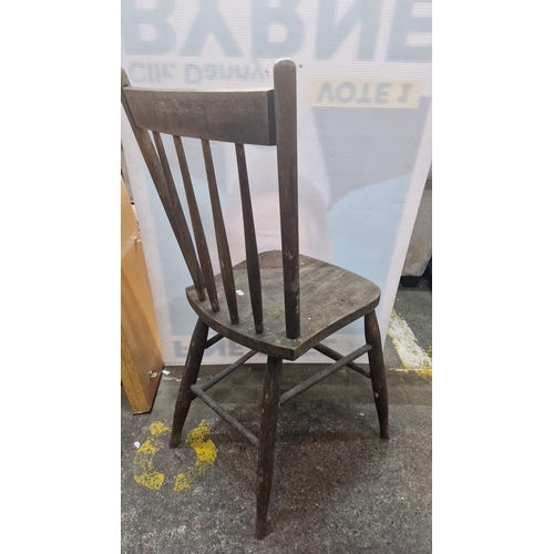 1400 - Rustic wooden chair, from the early 20th century, featuring turned spindle backrest and simple taper... 