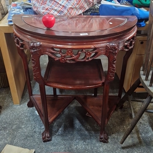 1401 - Star lot ;Carved mahogany demi-lune console table with intricate floral and dragon motifs. From the ... 