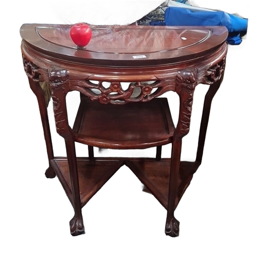 1401 - Star lot ;Carved mahogany demi-lune console table with intricate floral and dragon motifs. From the ... 