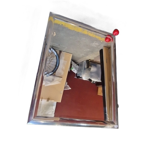 1403 - Large rectangular mirror with a sleek silver frame. Sturdy backing for secure mounting from the Gres... 