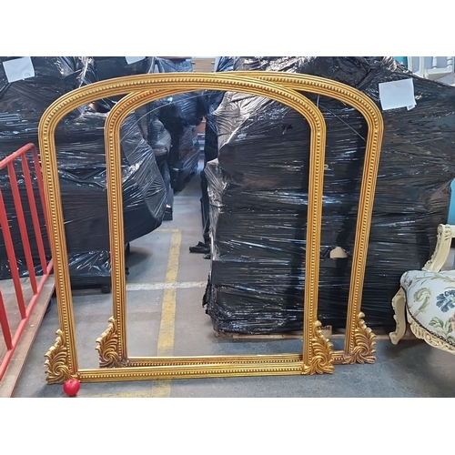 1409 - Two Elaborate gilt frames arched featuring ornate scroll and bead detailing.Approx 130cm wide and 12... 