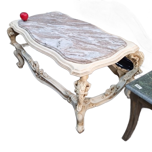 1410 - Star Lot : A French chateau Carved wood coffee table, featuring a cold Italian  marble top with orna... 