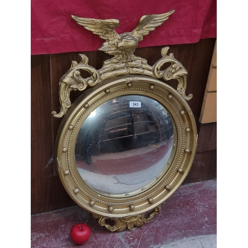 1450 - Star Lot : A fabulous large antique mirror with round convex glass housed in a gilt frame featuring ... 