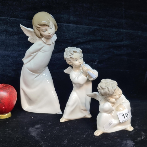 107 - A charming trio of Lladro figures in the forms of angels. All in good condition with Lladro mark to ... 
