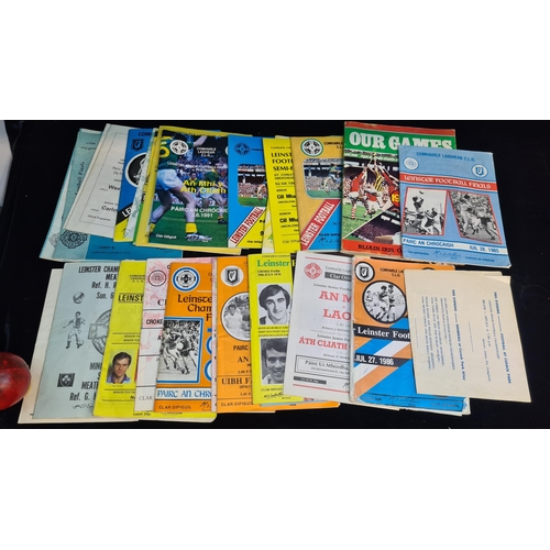 185 - A selection of 27 vintage Irish GAA football programmes from the 70s, 80s and 90s.