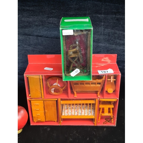 187 - An adorable selection of all in box wooden dollhouse furniture.