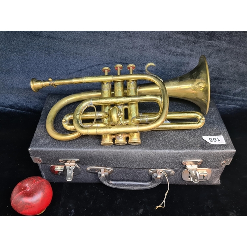 188 - Star Lot : A vintage solid brass trumpet housed in it's original hard shell travel case.
