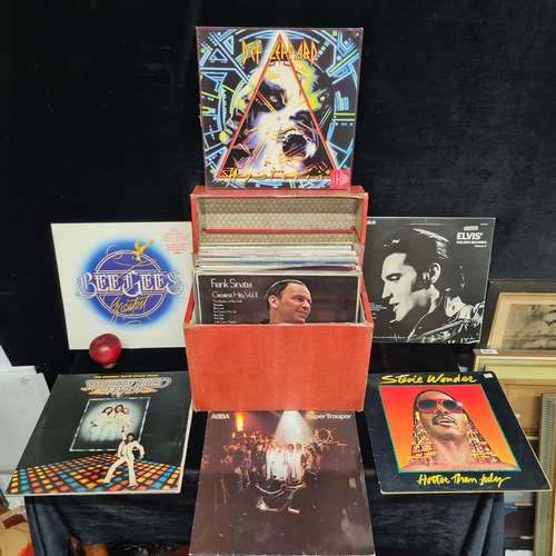 192 - A large and highly impressive selection of vintage vinyl records from various artists including The ... 