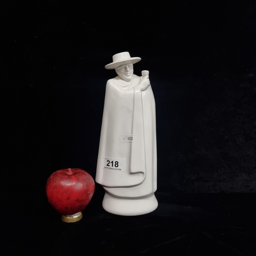 218 - A Wedgwood 'Moonstone' ceramic figure decanter. In good condition, missing original stopper.